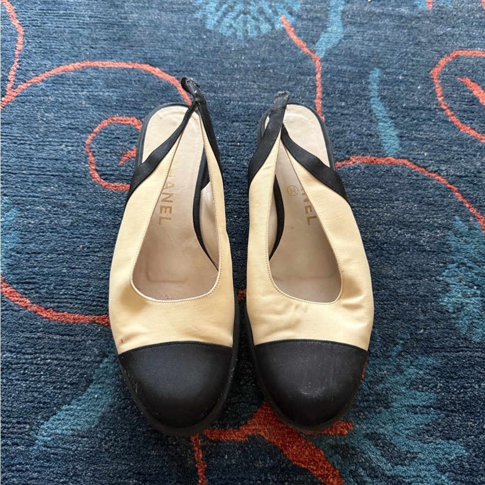 Chanel Black and Cream Mules with Sophisticated Two-Tone Design